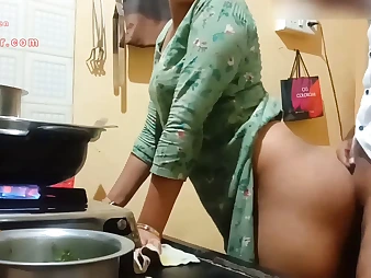 Observe this Indian Milf with a humungous arse get down and sloppy in the kitchen